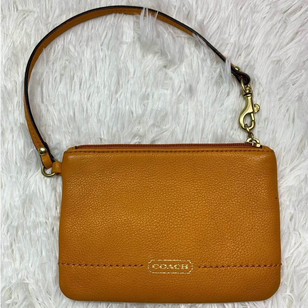 COACH Orange Wristlet